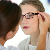 women trying on eyewear